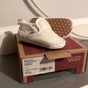 All white Vans Slip-On